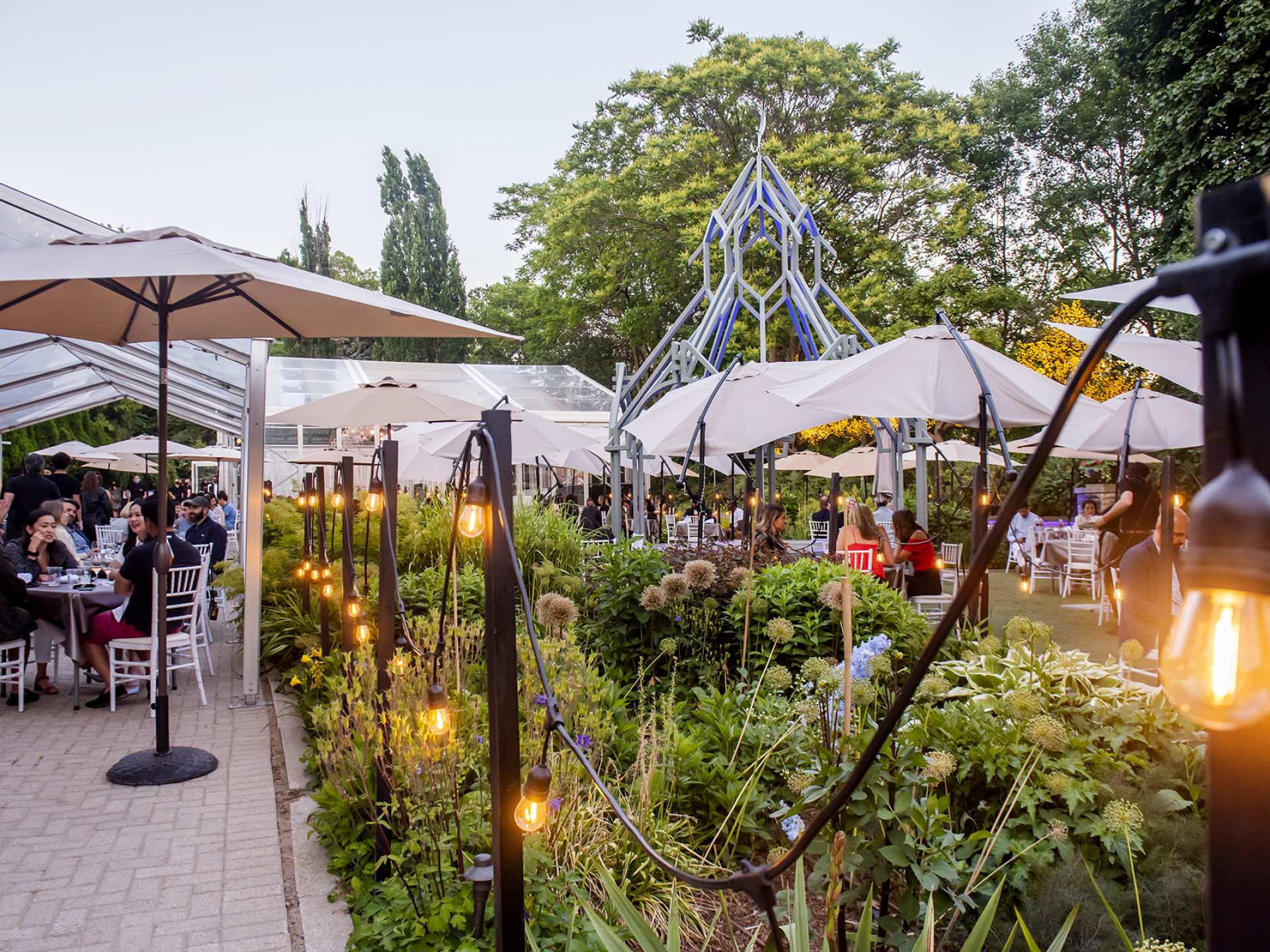 Best patios in Toronto | Bistro lights decorate The Gardens at Casa Loma