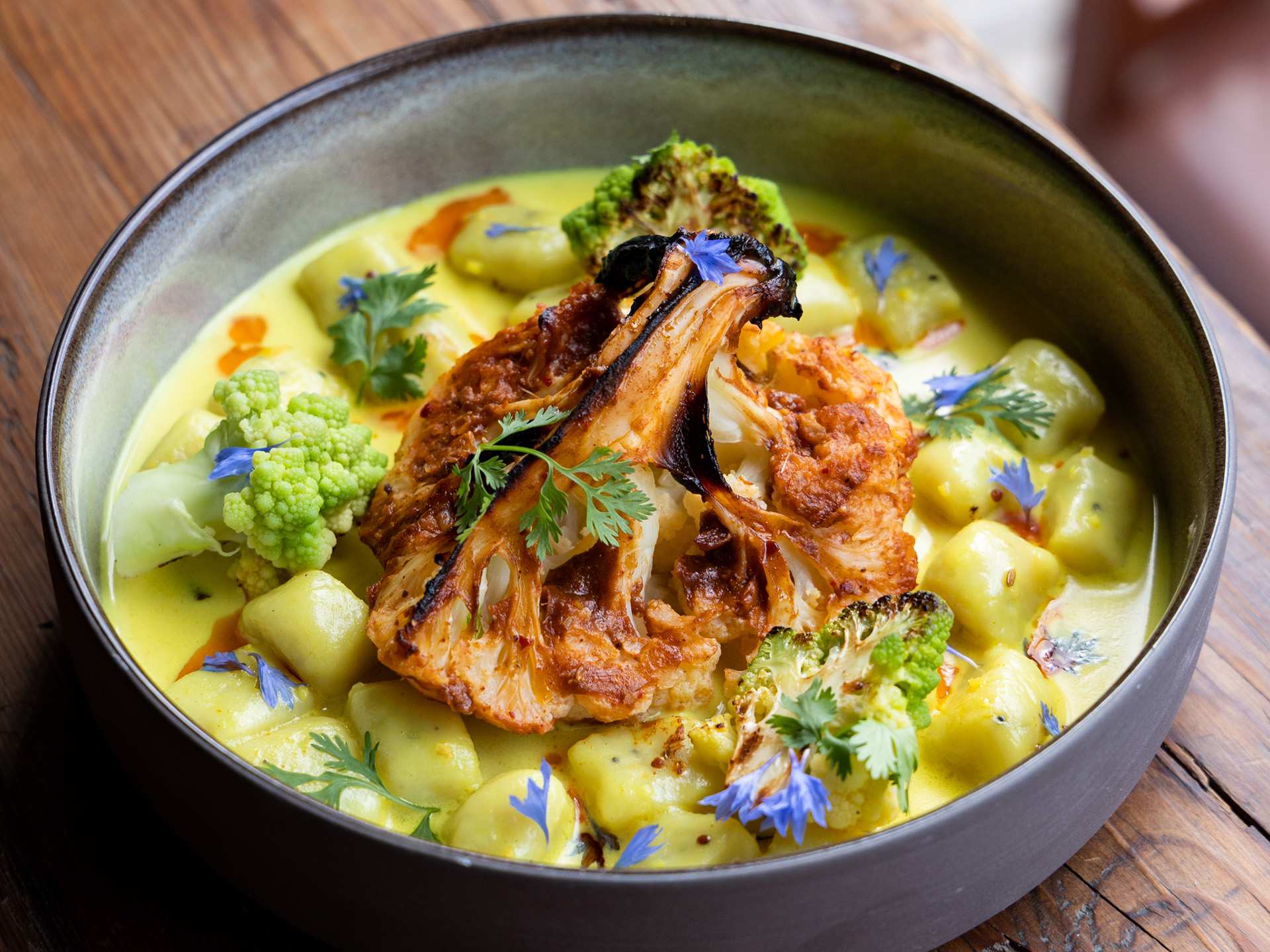 Best Summerlicious 2023 restaurants Toronto | Aloo gnocchi with roasted cauliflower curry at Curryish Tavern