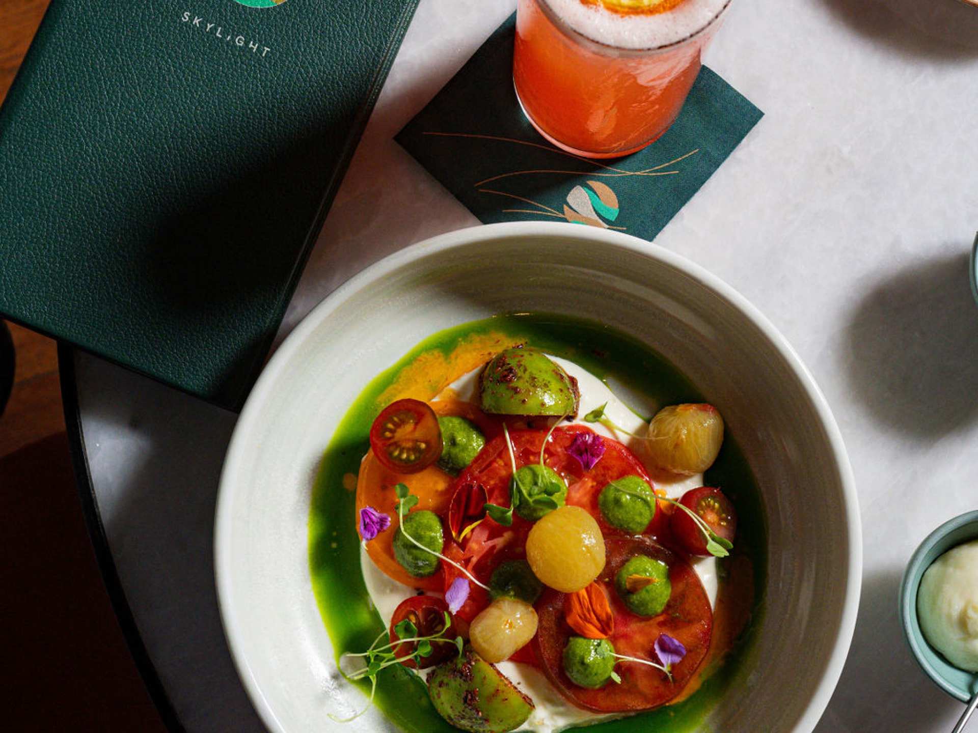 Best patios in Toronto | Heirloom tomato and stracciatella salad at Skylight at W Toronto hotel