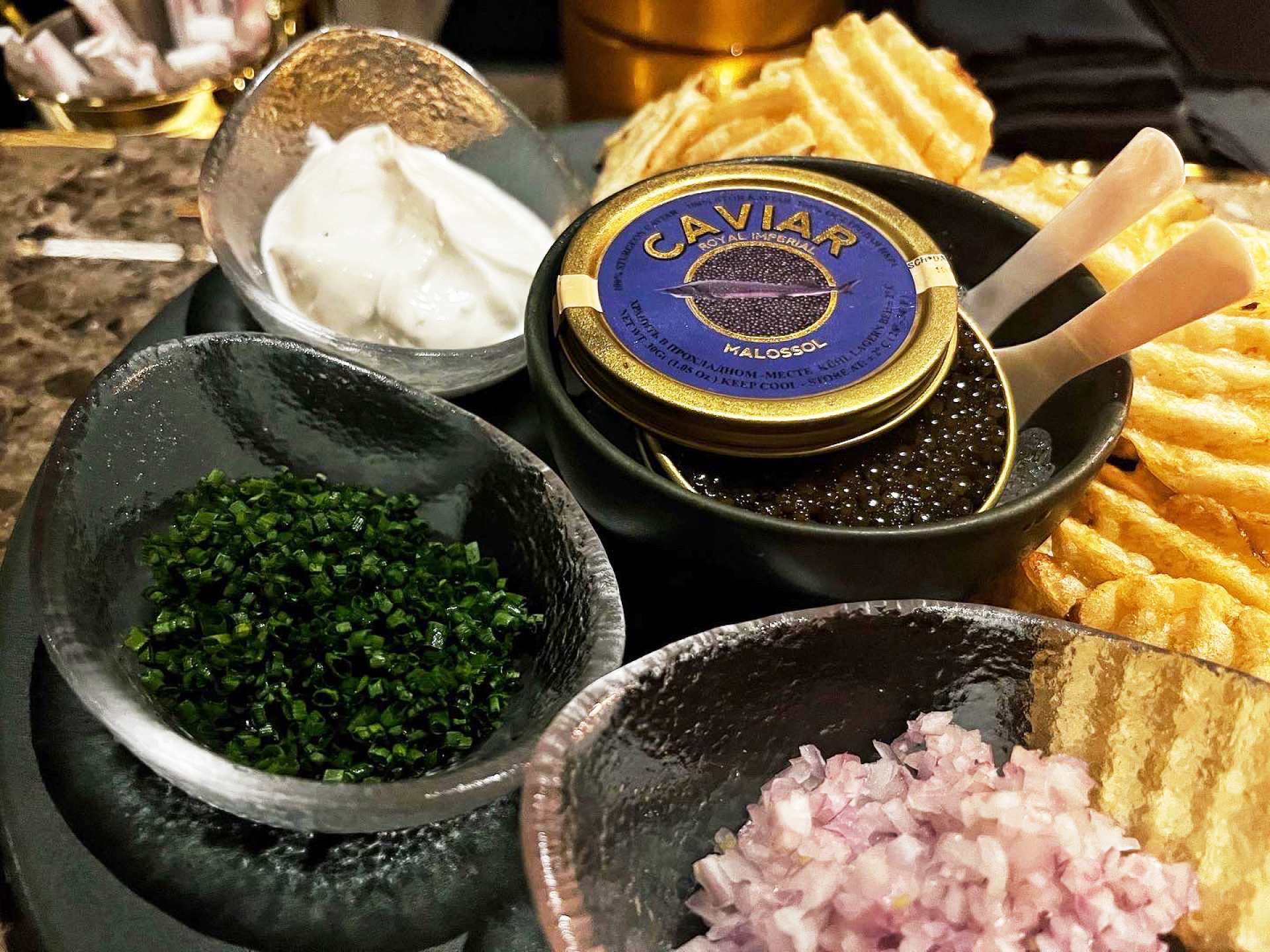 Parc Ave's Kaluga Gold Caviar served with potato chips