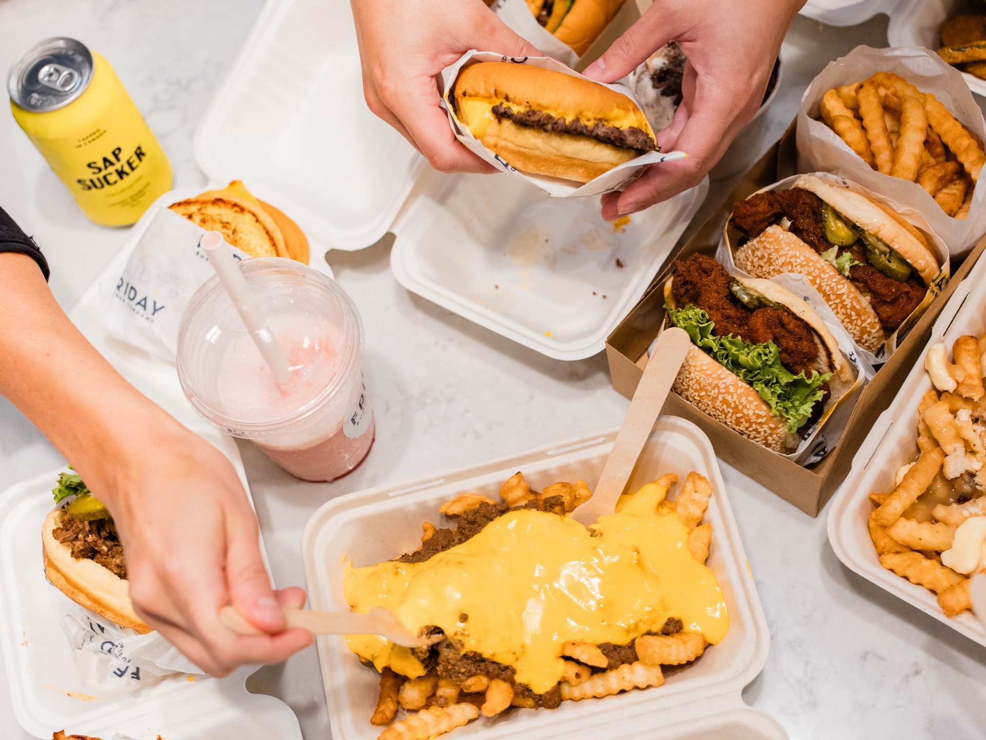 New Toronto restaurants | Cheese covered fries, poutine, burgers, fried chicken sandwiches and a milkshake at Friday Burger Company