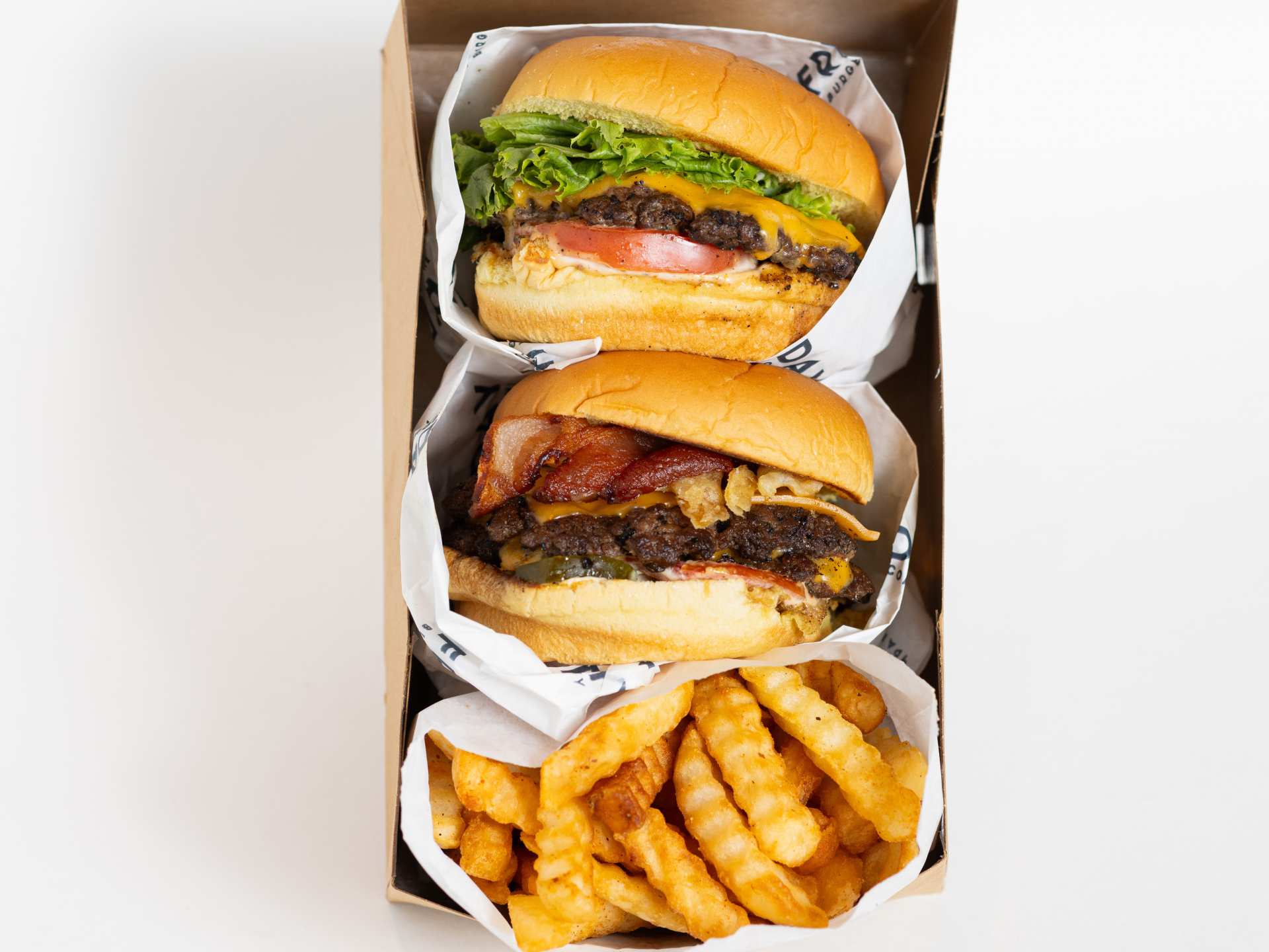 New Toronto restaurants | Two burgers and a side of fries at Friday Burger Company