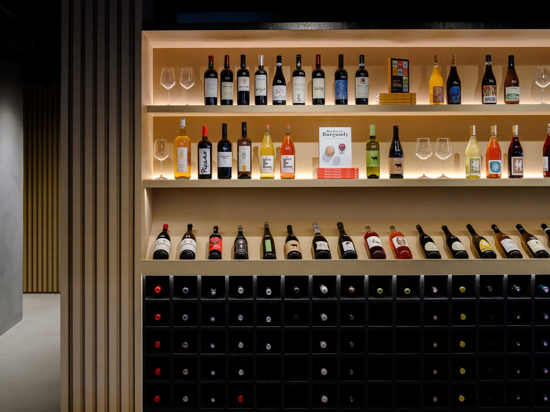 Best wine bars Toronto | A shelf of wine at The Daughter