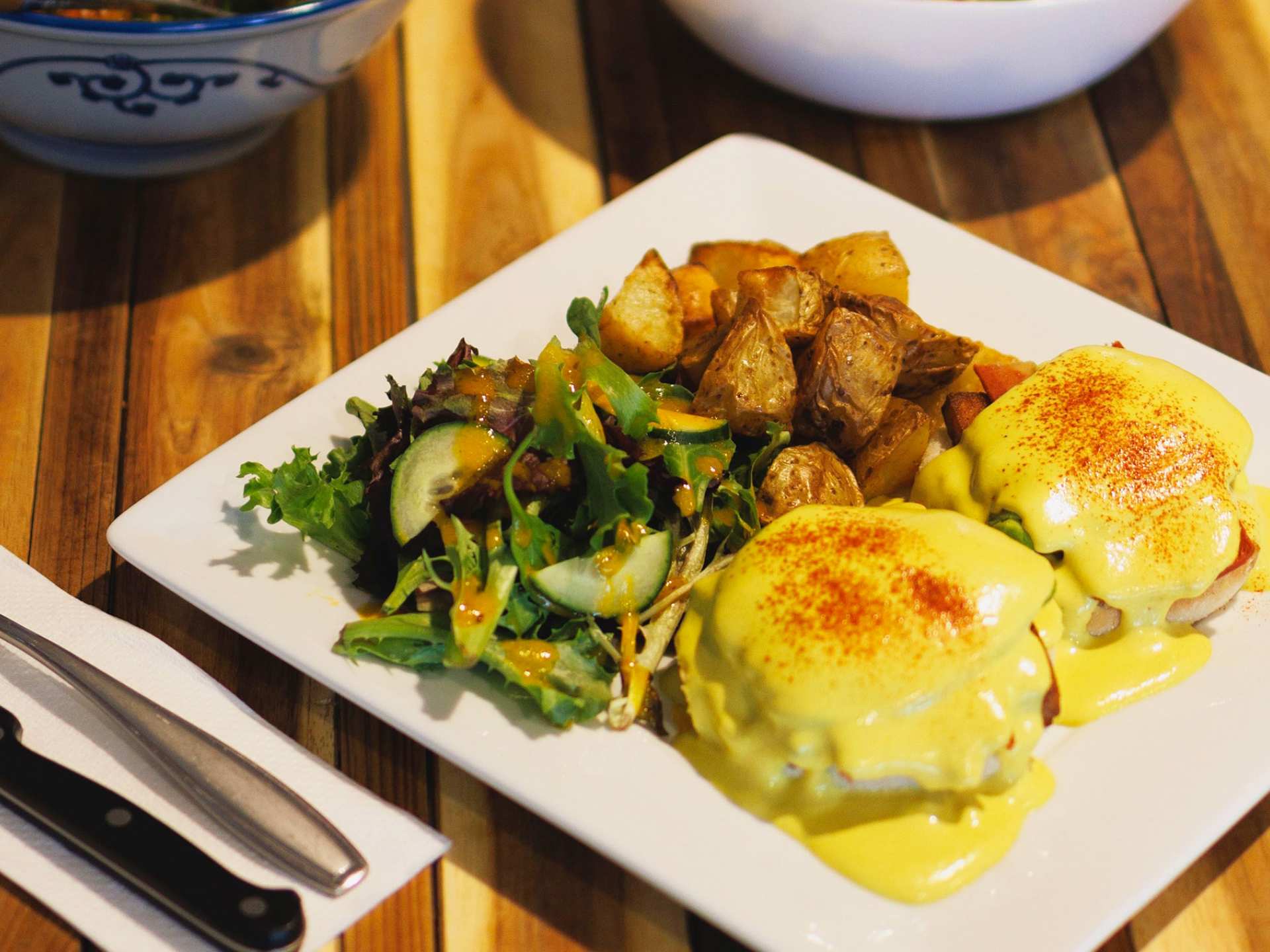 The best vegan restaurants in Toronto | A breakfast platter with eggs benny at Animal Liberation Kitchen