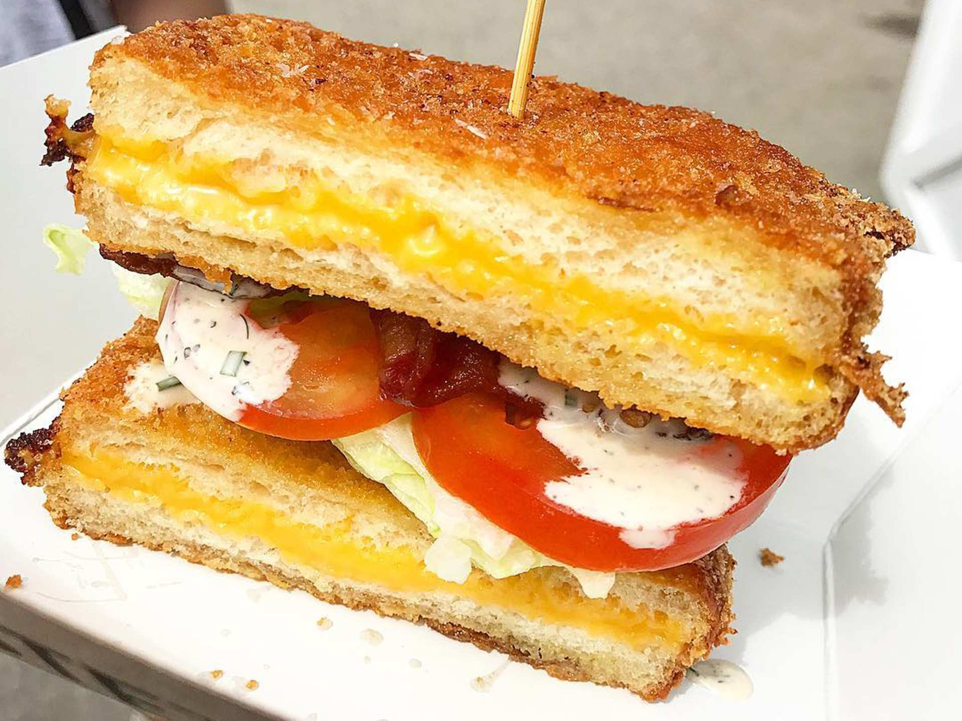 Brunch Fest | A grilled cheese sandwich with white cheese and tomatoes