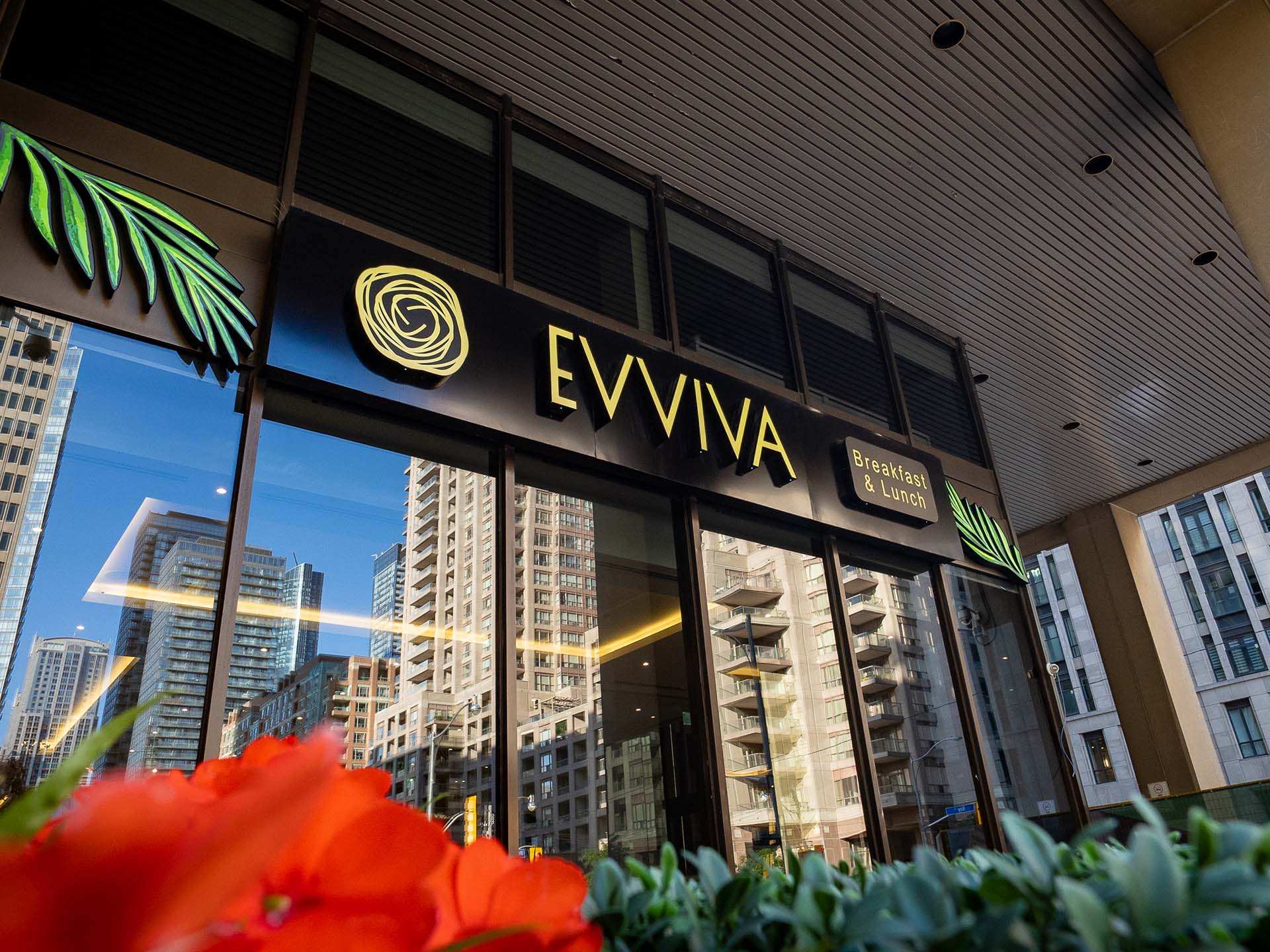The best brunch in Toronto | The black sign for Evviva