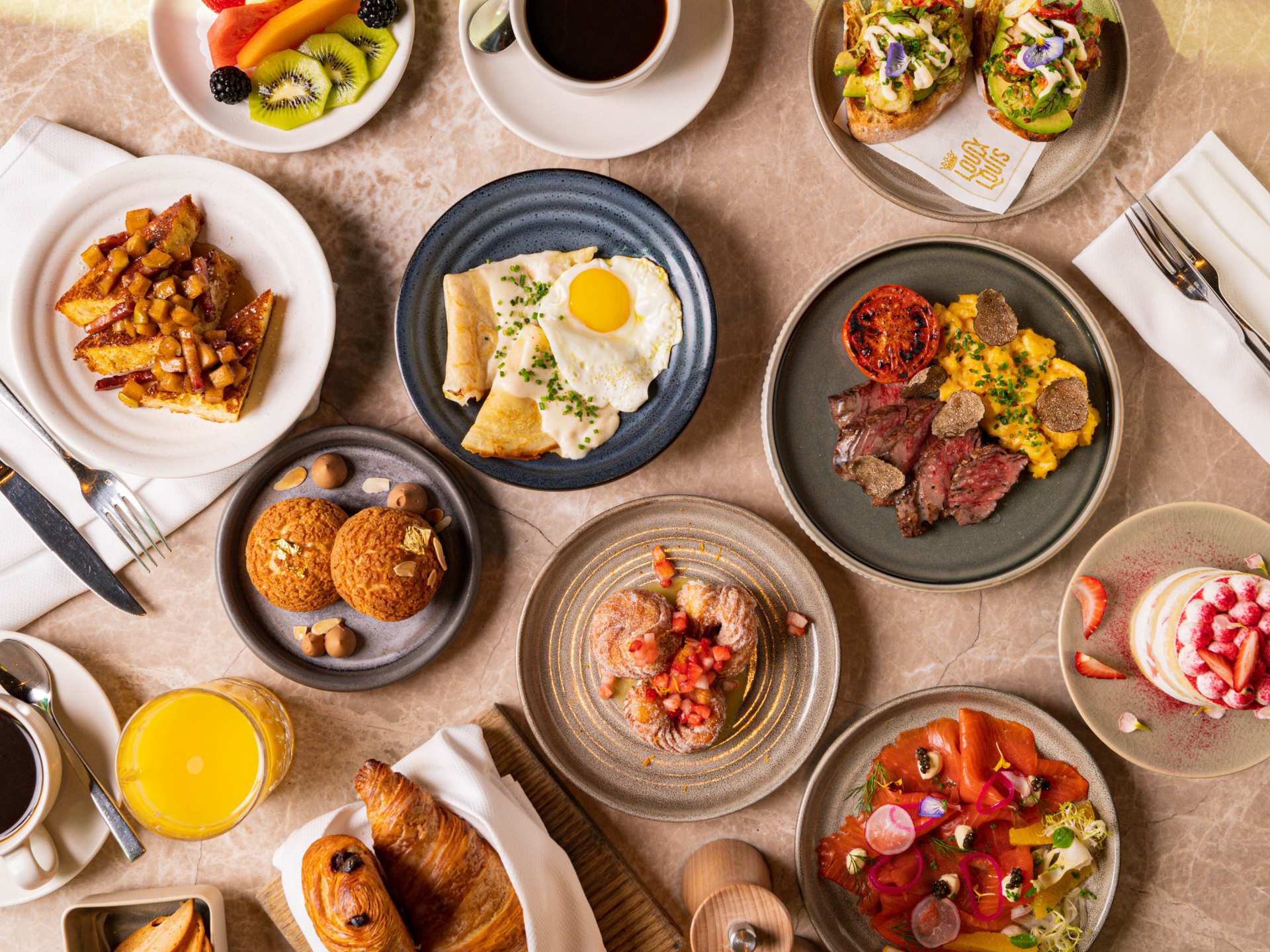 Best brunch in Toronto | A spread of brunch dishes at Louix Louis