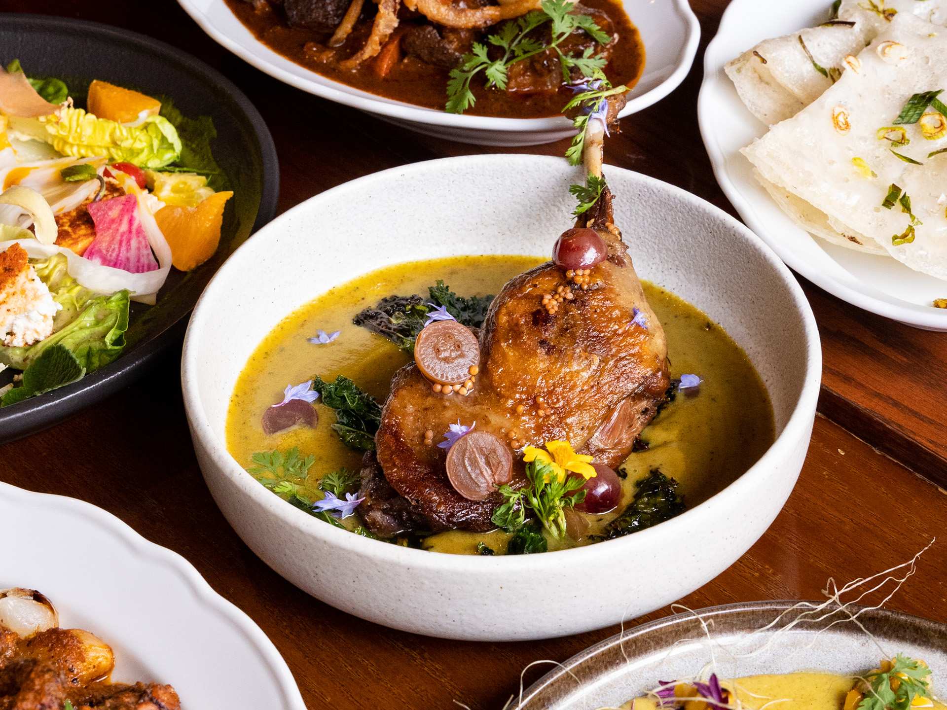 Summerlicious Toronto | A cut of meat in a curry broth at Curryish Tavern