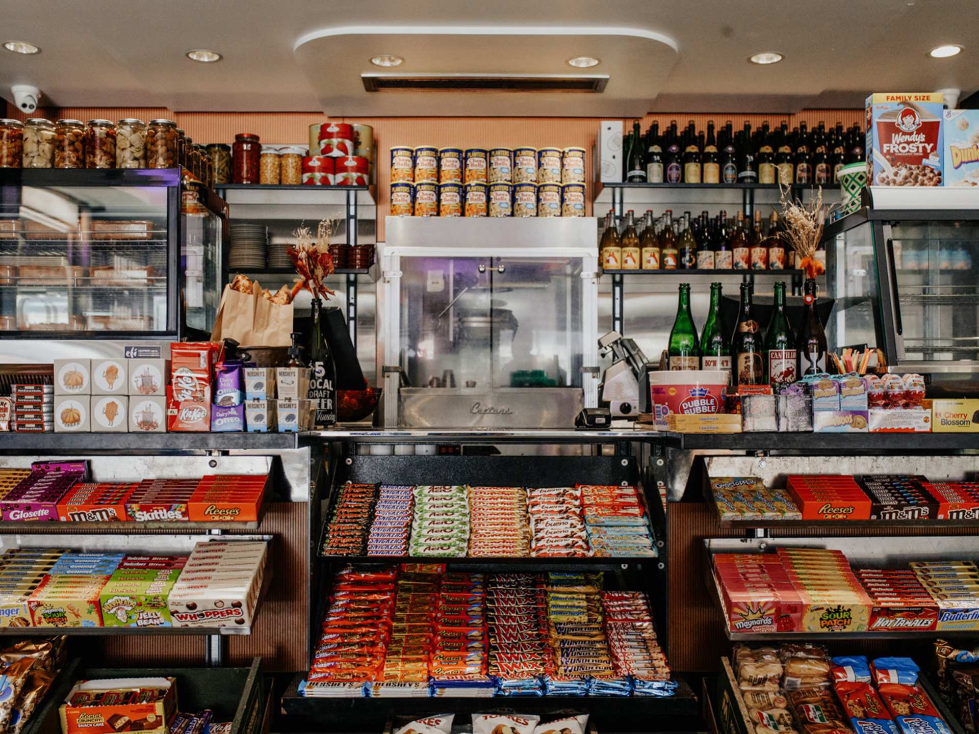 Toronto bottle shops and alcohol stores | Concession counter with candy and speciality products at Bottega Volo in Littly Italy, Toronto