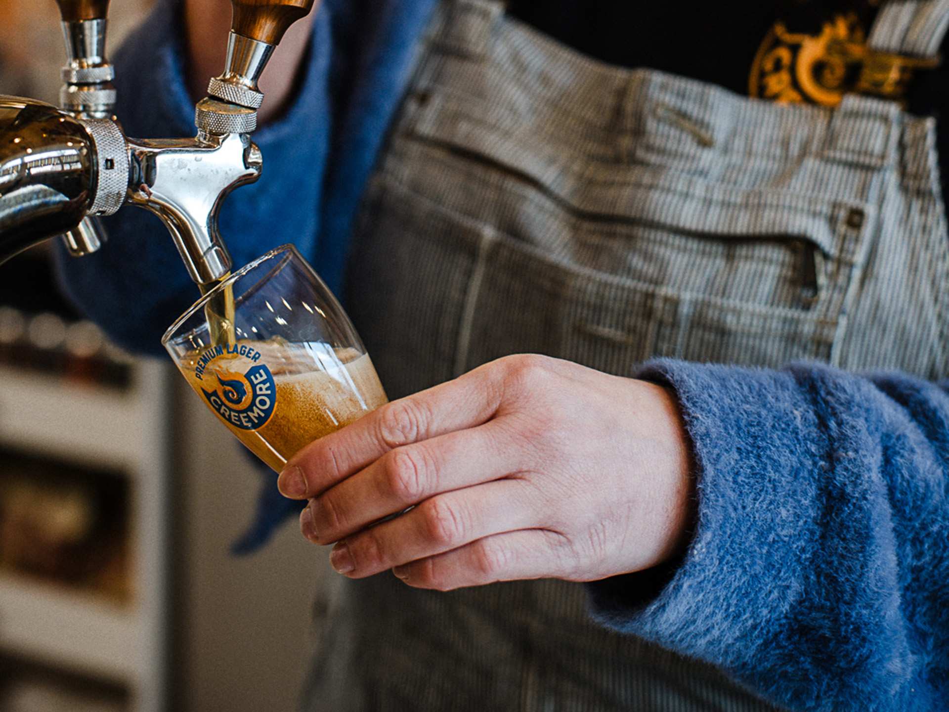 Pouring a Creemore Springs Brewery beer