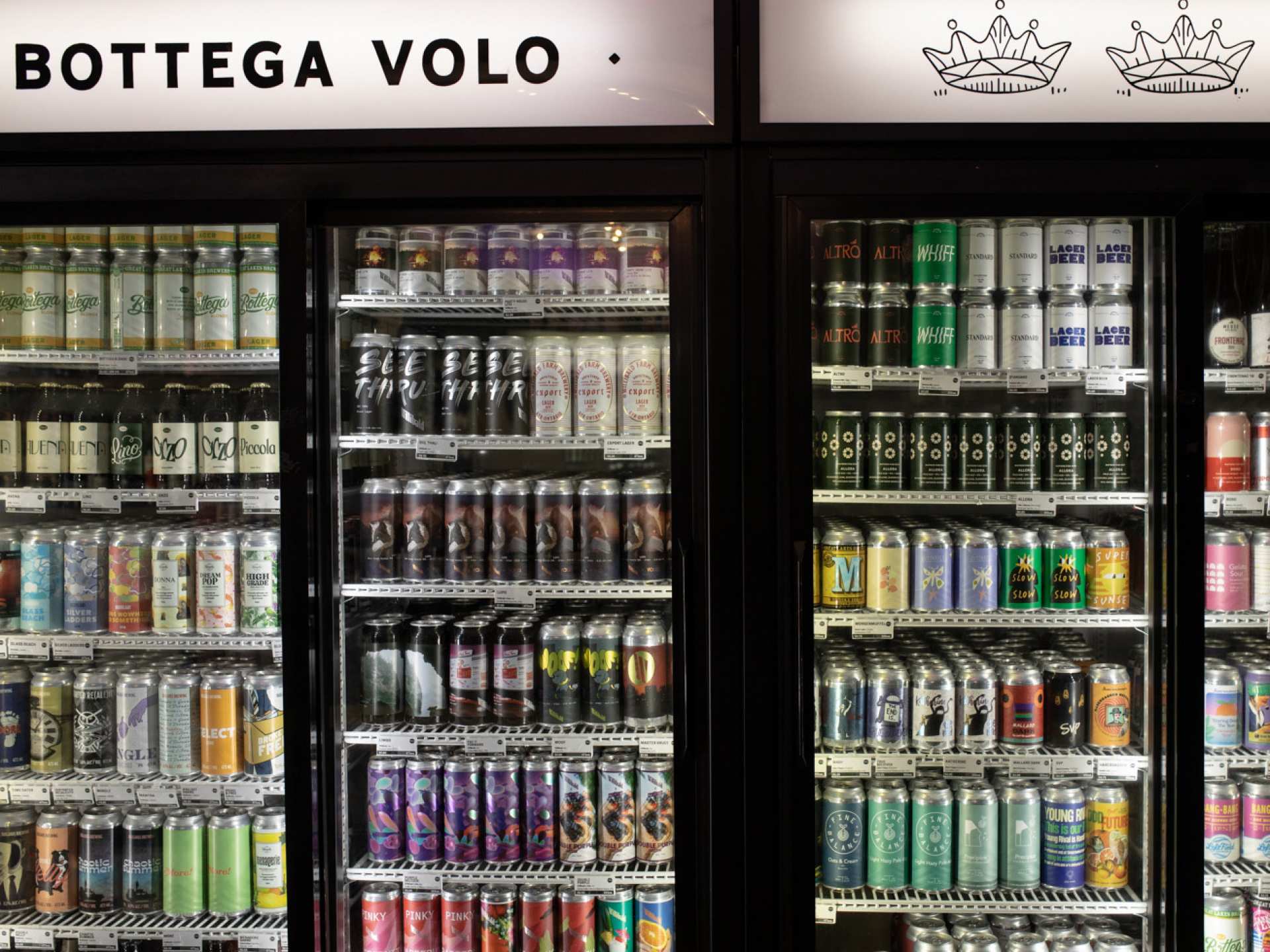Toronto bottle shops and alcohol stores | Beer fridges at Bottega Volo in Littly Italy, Toronto