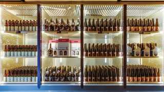 Alcohol delivery in Toronto | A fridge stocked with beer at Birroteca, the brewery and bottleshop inside of Eataly in Toronto