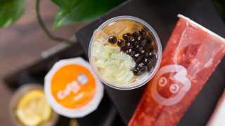 The best bubble tea in Toronto | an overhead view of tapioca pearls and jelly in a bubble tea from CoCo