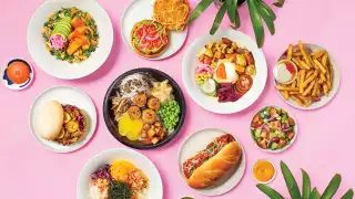 A spread of plant-based dishes from SweetChops, vegan food delivery in Toronto