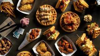 Best Southern soul food restaurants Toronto | a spread of fried chicken and waffles from the Dirty Bird