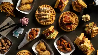 Best Southern soul food restaurants Toronto | a spread of fried chicken and waffles from the Dirty Bird Best Southern soul food restaurants Toronto | a spread of fried chicken and waffles from the Dirty Bird