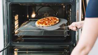 The best pizza in Toronto | A pepperoni pizza coming out of the oven at General Assembly Pizza