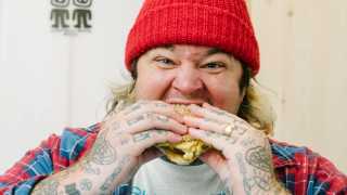 Matty Matheson | Matheson tucks into a cheeseburger at Matty's Patty's