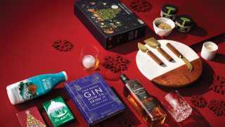 Food and drink holiday Christmas gifts | A flat lay of holiday-themed gifts