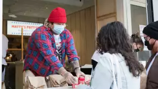 The best new restaurants in Toronto | Matty Matheson handing out burgers at Matty's Patty's on Queen West