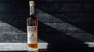 High West American craft whisky is now available at LCBO | A bottle of High West American Prairie Bourbon against a dark wood background