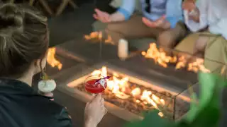 The best Toronto hotels for a staycation | Cocktails by the fire at The Shangri-La hotel