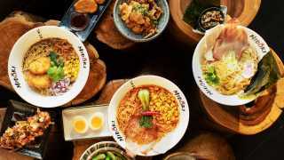 The best ramen in Toronto | A spread of ramen and other dishes at Midori