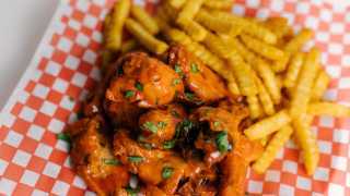 The best new restaurants in Toronto | Betty's chicken wings from the newly opened CoMMO Kitchen