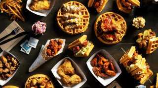 The best fried chicken sandwiches in Toronto | A full spread of fried chicken and waffles from Dirty Bird