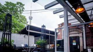 The best patios in Toronto | A view of the CN Tower from the patio at Xango