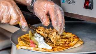 The best shawarma in Toronto | Preparing a chicken shawarma wrap at Chef Harwash