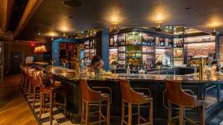 Restaurant Review: The Rabbit Hole, a whimsical British pub | The bar inside The Rabbit Hole