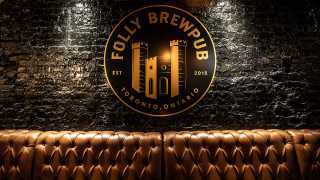 The Folly Brewpub logo sits above the banquettes