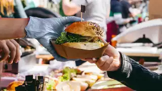 T.O. Food & Drink Fest | A vendor serves a hamburger