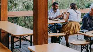 Canada Beergarden tables | Couple sitting at Beergarden picnic table with drinks