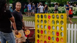 People play lawn games at Fizz Fest