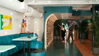 Grape Crush bottle shop and wine bar | Inside the teal-blue shop