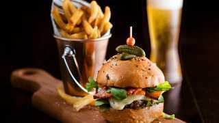 Accessible restaurants in Toronto | A burger at Café Boulud