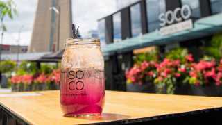 Accessible restaurants in Toronto | A cocktail on the patio at SOCO