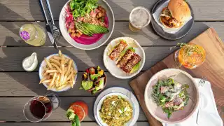 Accessible restaurants in Toronto | A spread of food at SOCO