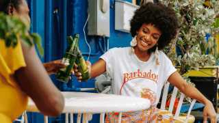 Visit Barbados | Sipping beer in the sunshine