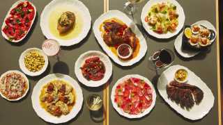 Alder restaurant review | A spread of food at Alder, inside the Ace Hotel Toronto