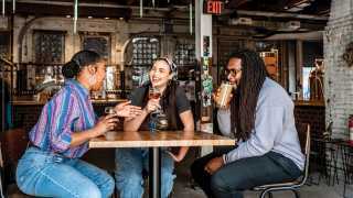 Friends enjoying drinks at Pittsburgh's Craft Beverage Experience