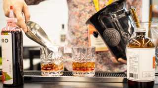 Win two tickets to SIAL | A bartender makes drinks