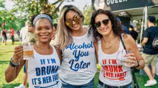 Toronto's Festival of Beer | Three people holding beers and smiling at the camera at Toronto's Festival of Beer