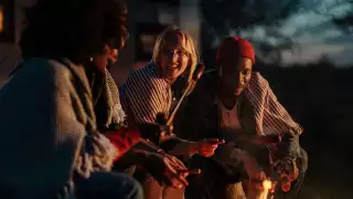 Deerhurst Resort in Muskoka | People sitting around a fire Deerhurst Resort in Muskoka | People sitting around a fire