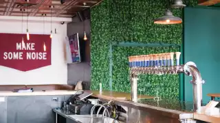Toronto bottle shops and alcohol stores | Beer taps and baseball-themed signage at Left Field Brewery in Liberty Village, Toronto