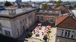 A drone shot of the patio at G. H. Mumm's champagne house in Reims