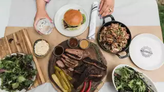 Shop Carbon Bar | An overhead shot of a BBQ spread from Carbon Bar