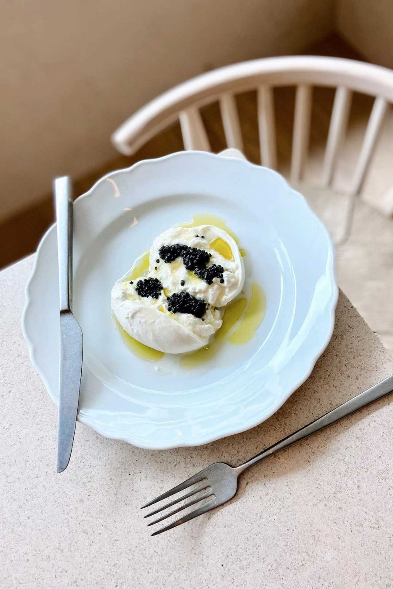 At Osteria Giulia, the Burrata a Caviale incorporates caviar